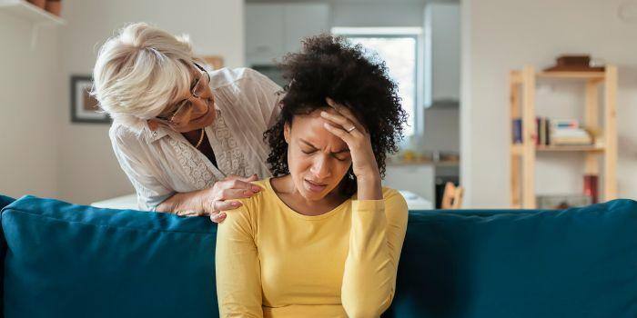 Grandmother-Comforting-Her-Granddaughter-After-a-Family-Emergency