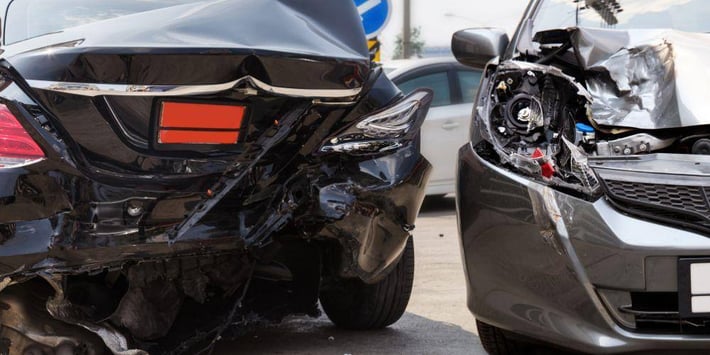 Silver-Sedan-and-a-Black-Sedan-in-the-Aftermath-of-a-Car-Crash