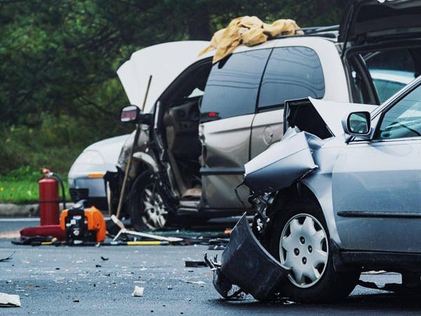 Crashed-Minivan-and-Sedan-at-an-Accident-Scene