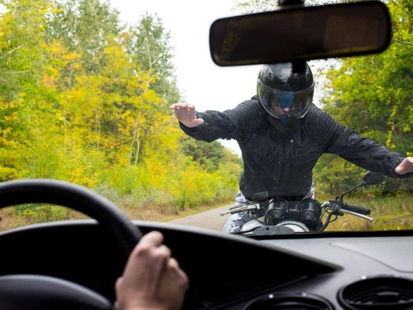 motorcycle driver crashes into a car in georgia